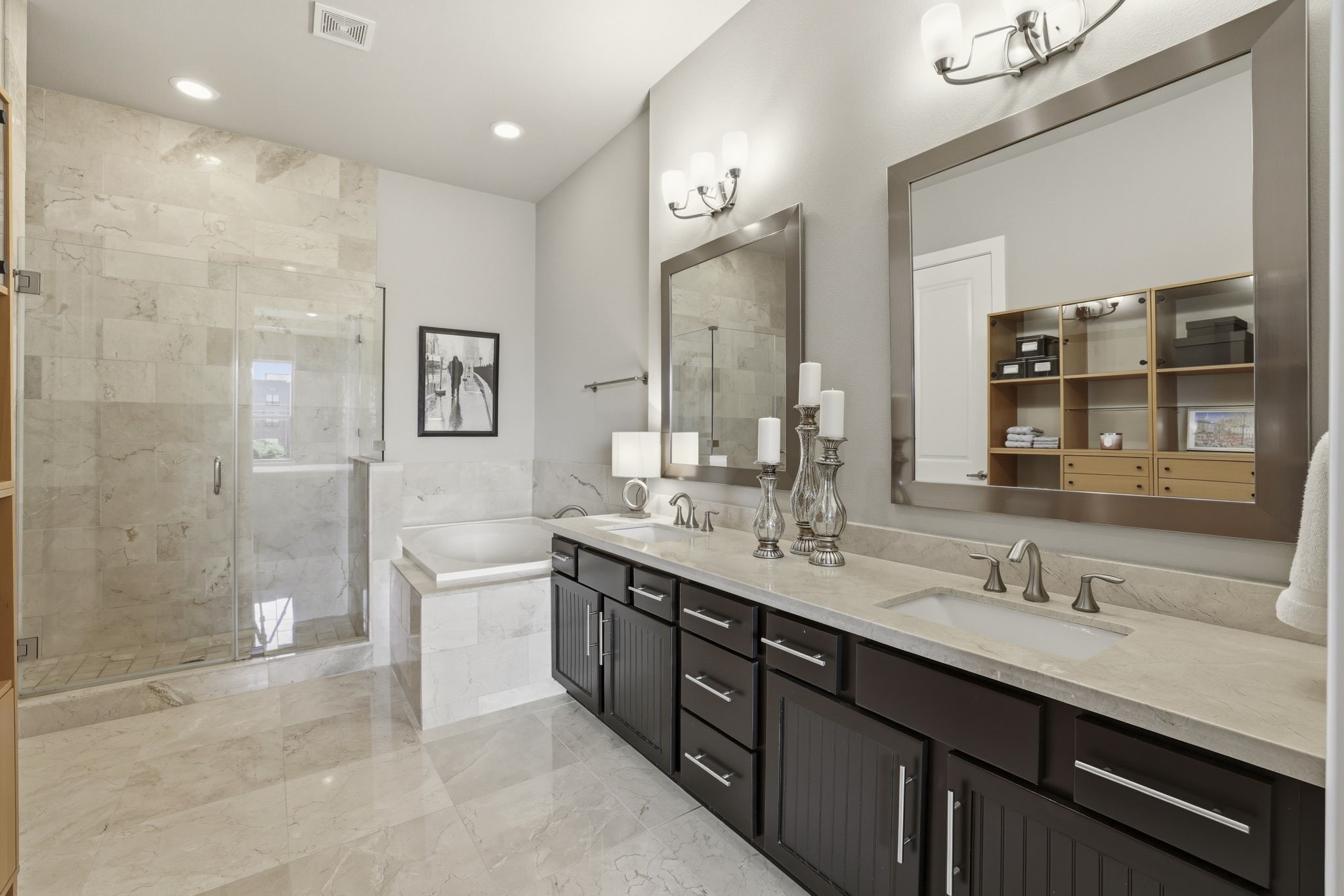 4102 Marina Street Houston, TX 77007 - Photo 22 of 32 The primary bathroom is not only elegant in design, but it is also easily functional for two.
