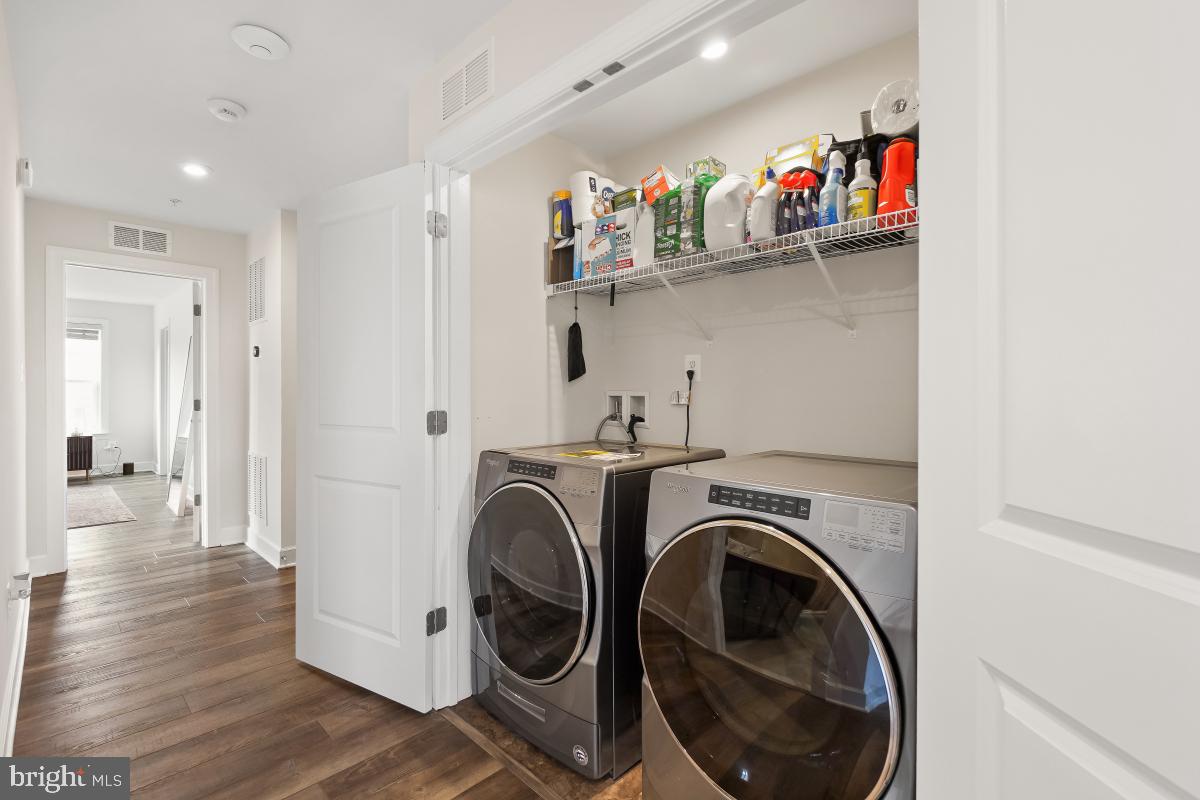 2945 Duvall Ridge Road, Unit 573 Hyattsville, MD 20785 - Photo 17 of 23 a view of entryway with washer and dryer