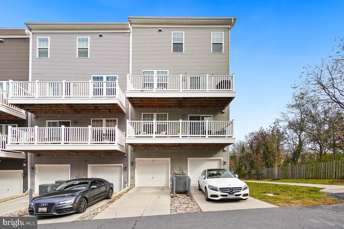 2945 Duvall Ridge Road, Unit 573 Hyattsville, MD 20785 - Photo 20 of 23 a car parked in front of a house