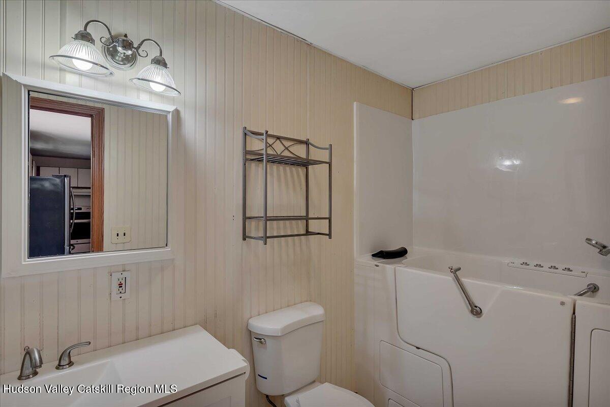 35 Banta Lane Cairo, NY 12413 - Photo 12 of 33 a bathroom with a toilet a sink and mirror
