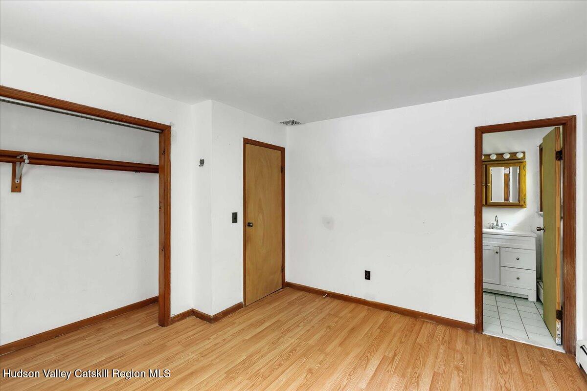 35 Banta Lane Cairo, NY 12413 - Photo 17 of 33 a view of an empty room and wooden floor