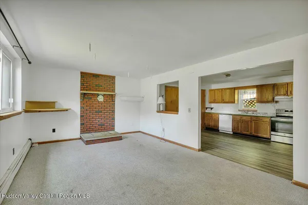 a view of an empty room and window