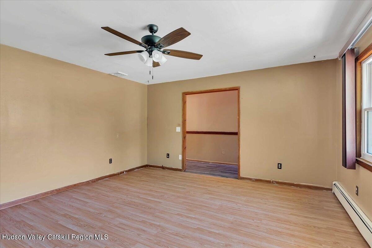 35 Banta Lane Cairo, NY 12413 - Photo 7 of 33 wooden floor in an empty room with a window