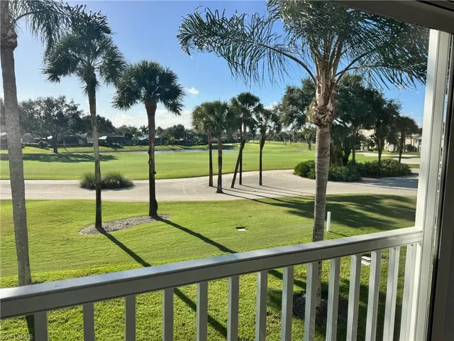a view of swimming pool from a balcony