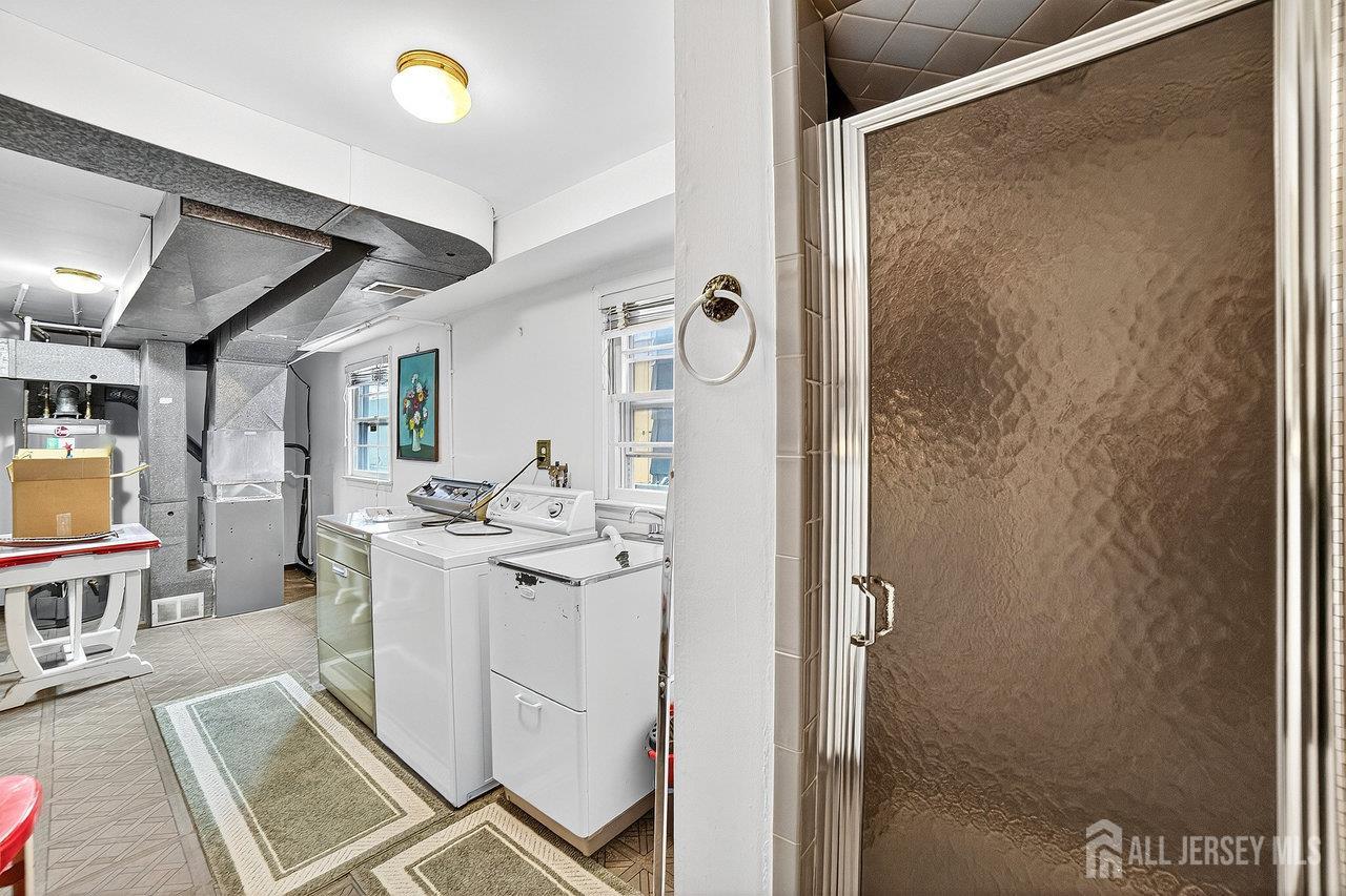 307 Sutton Street Perth Amboy, NJ 08861 - Photo 20 of 27 a view of living room with granite countertop furniture and fireplace