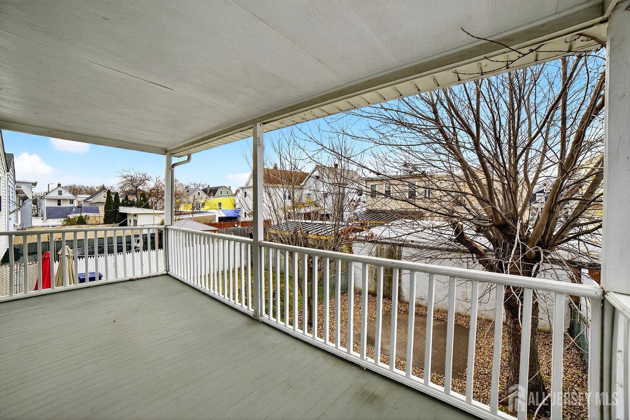 307 Sutton Street Perth Amboy, NJ 08861 - Photo 10 of 27 a view of a porch