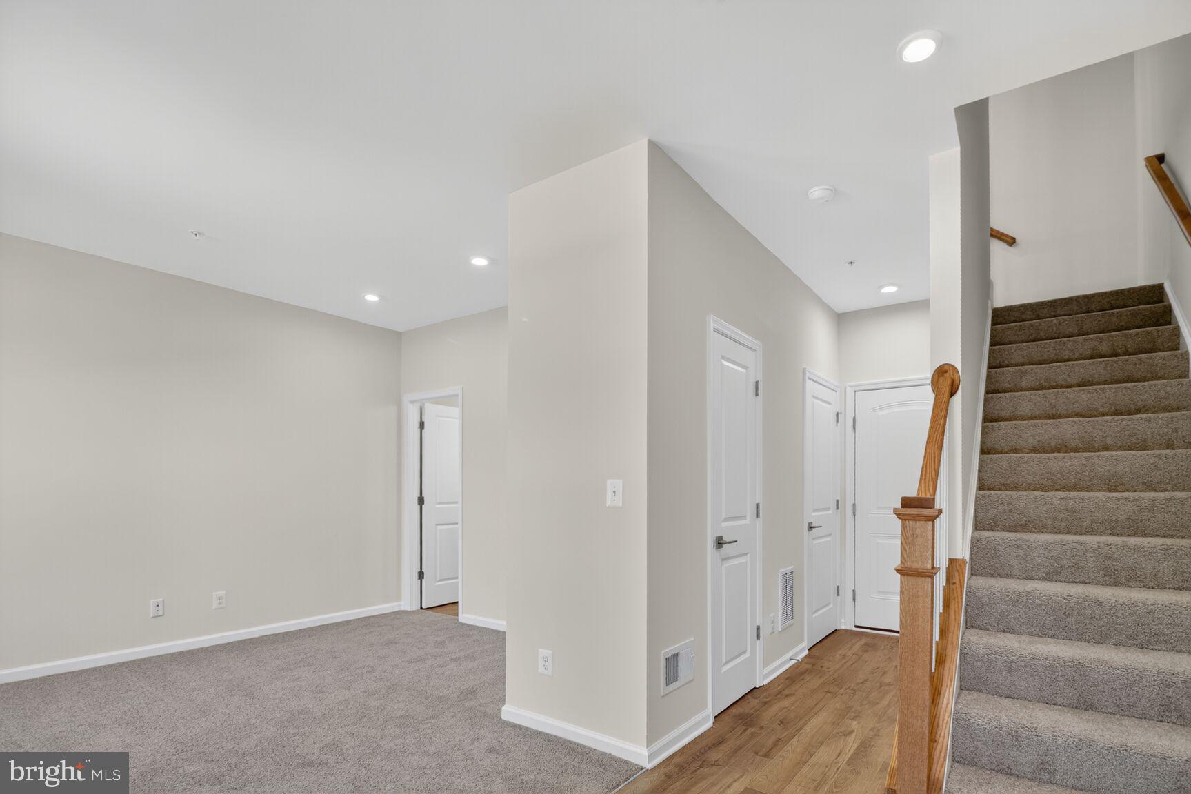 1802 John Stricker Avenue Baltimore, MD 21222 - Photo 3 of 47 a view of entryway with stairs and wooden floor