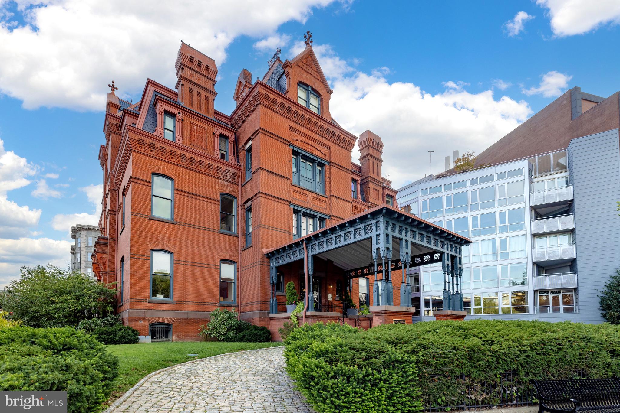 front view of a building with a yard
