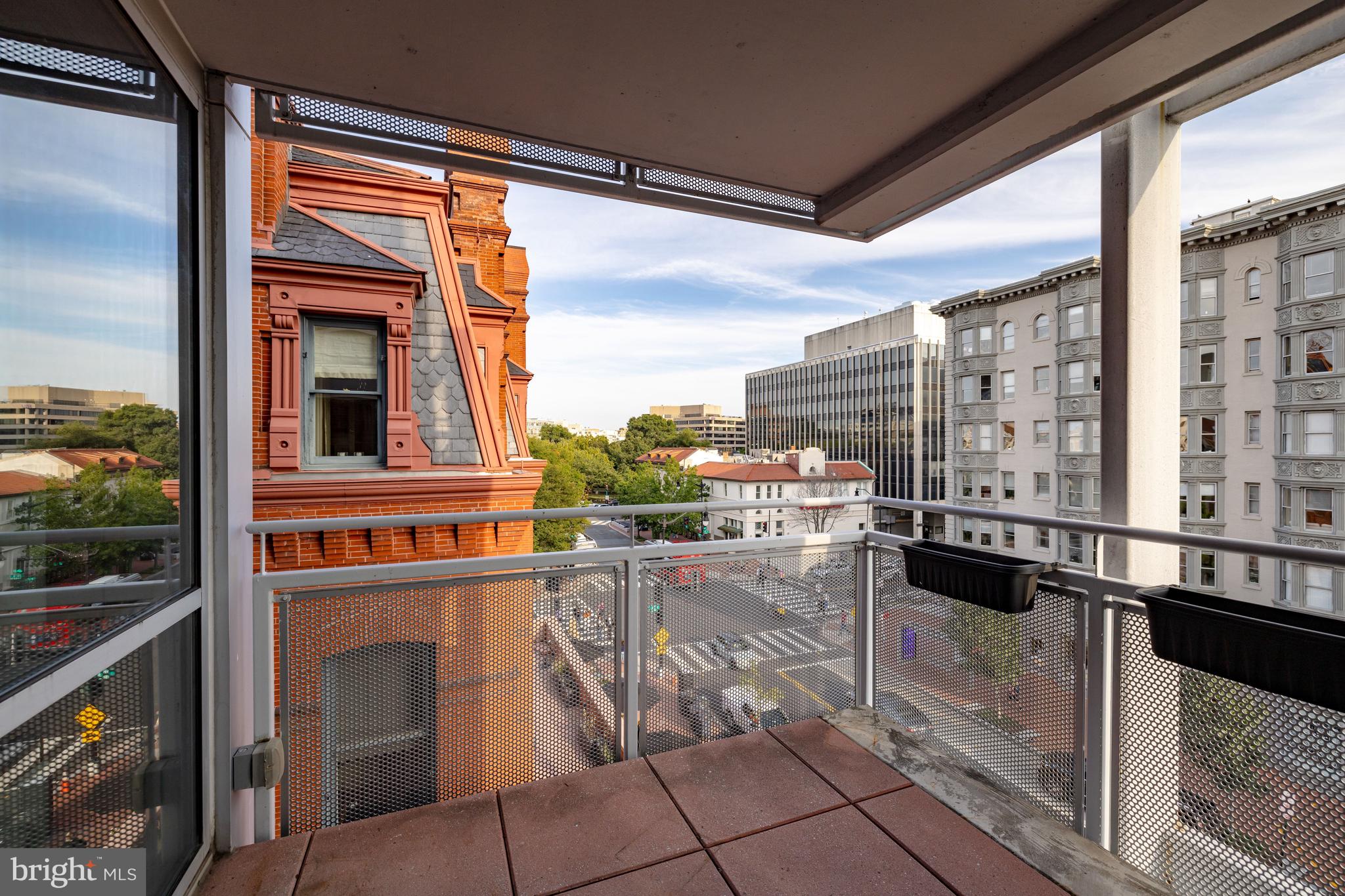 2002 Massachusetts Avenue Northwest, Unit R3 Washington, DC 20036 - Photo 12 of 27 a view of a balcony with furniture