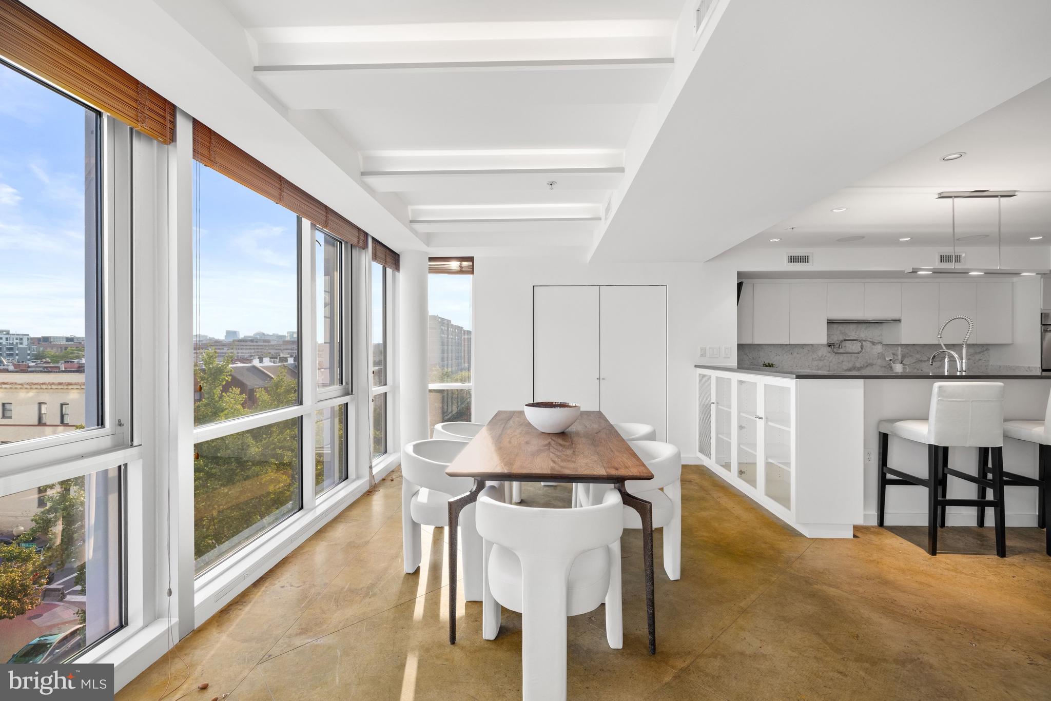 2002 Massachusetts Avenue Northwest, Unit R3 Washington, DC 20036 - Photo 7 of 27 a dining room with furniture and window