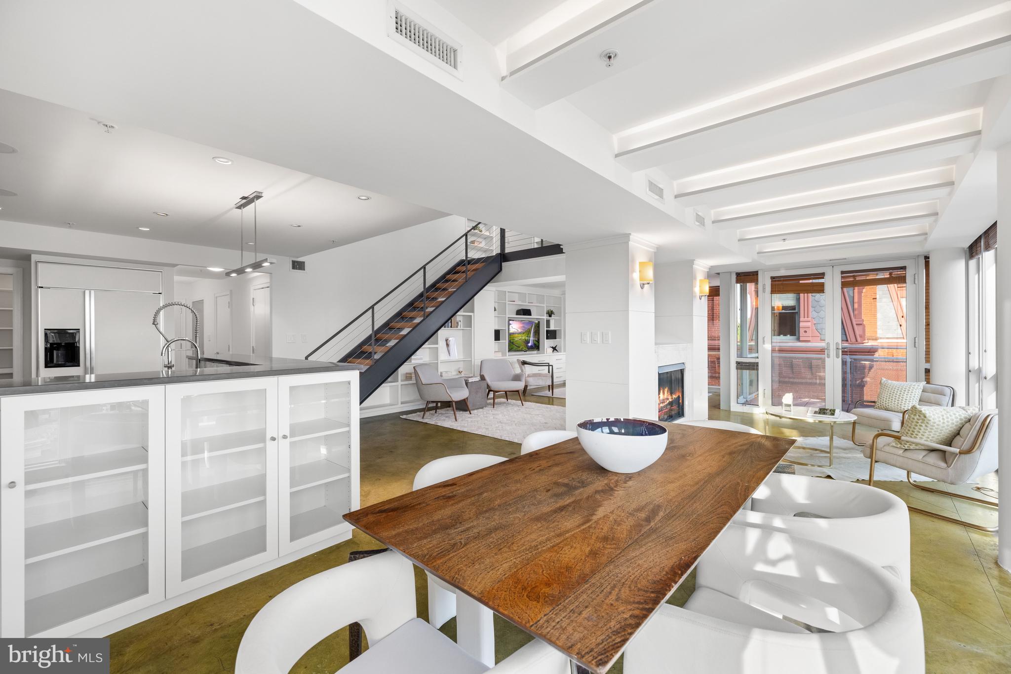 2002 Massachusetts Avenue Northwest, Unit R3 Washington, DC 20036 - Photo 8 of 27 a living room with furniture and a table
