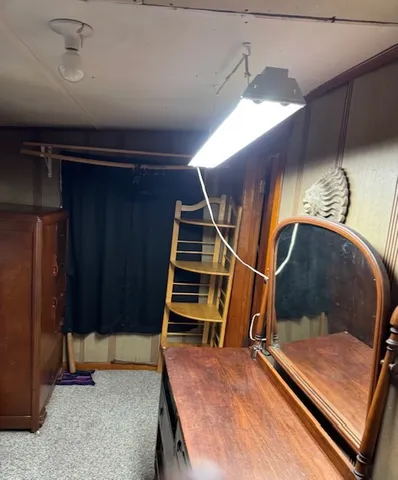 a room with stairs and furniture