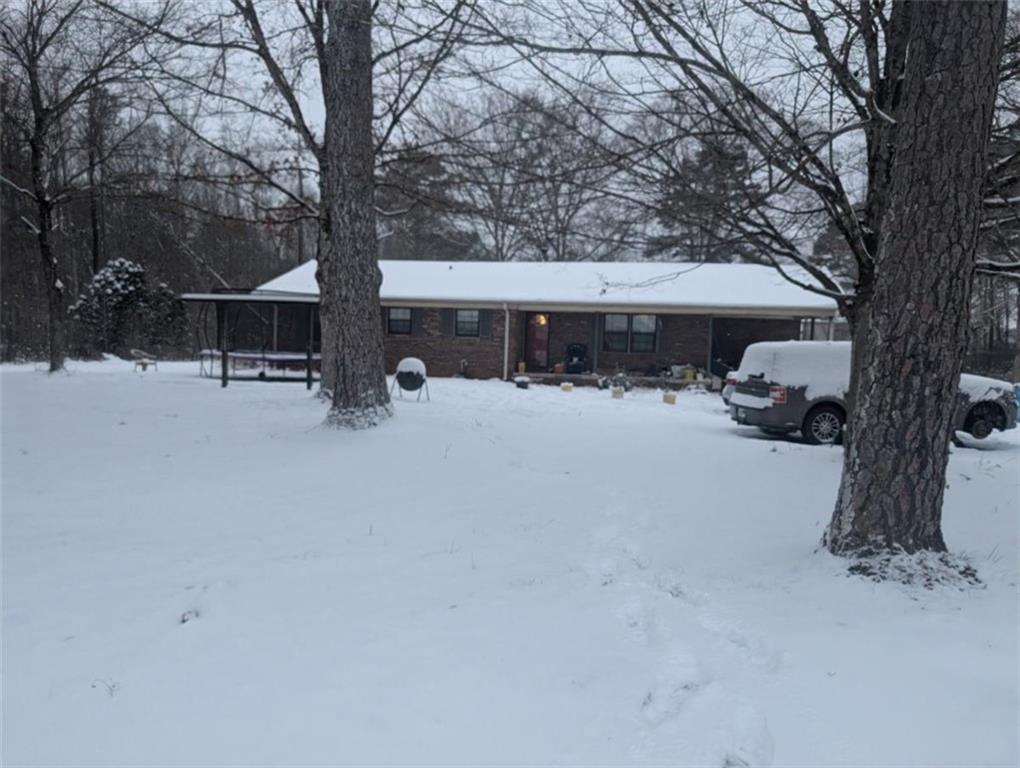 a view of a car parked in front of house