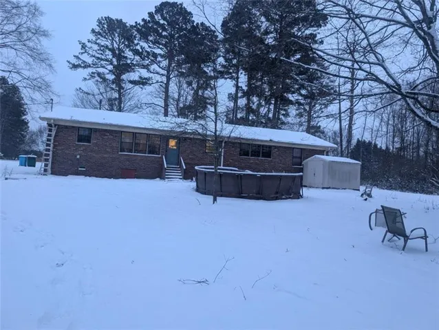 a view of house with outdoor space