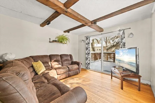 a living room with furniture and a table