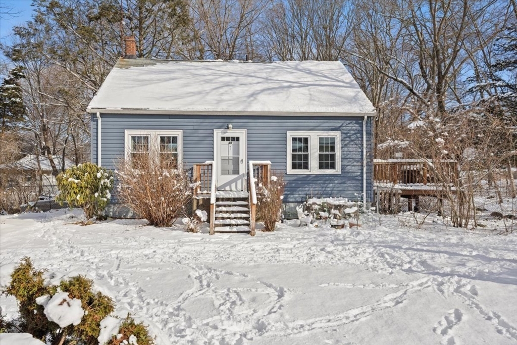45 Dorr Street Randolph, MA 02368 - Photo 2 of 28 a view of a house with a yard and covered with snow