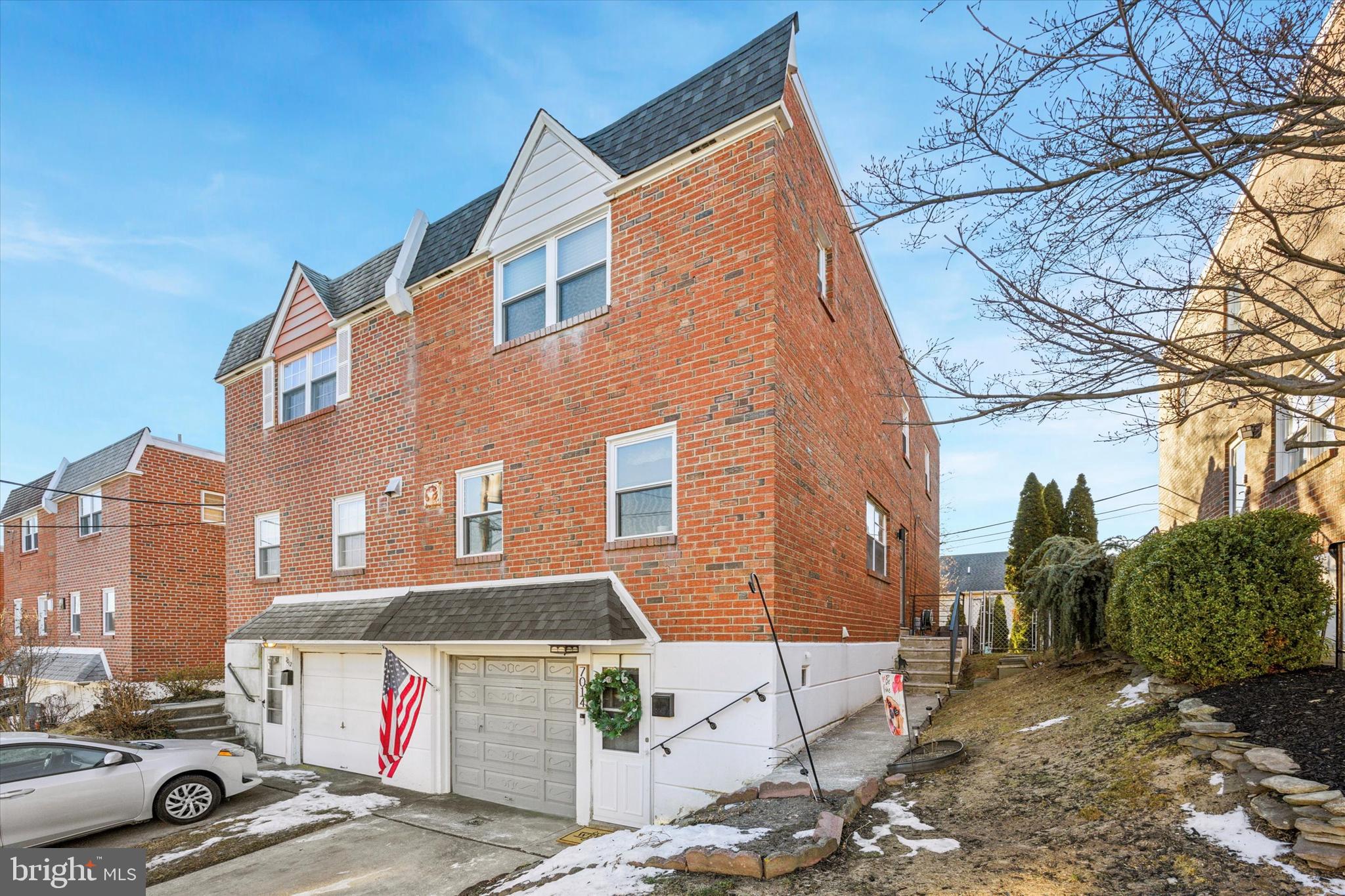 7014 Matthias Street Philadelphia, PA 19128 - Photo 1 of 35 a front view of a building with parking space