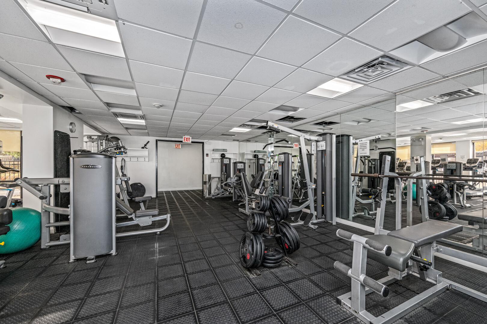 3930 North Pine Grove Avenue, Unit 1109 Chicago, IL 60613 - Photo 11 of 24 a view of a room with gym equipment