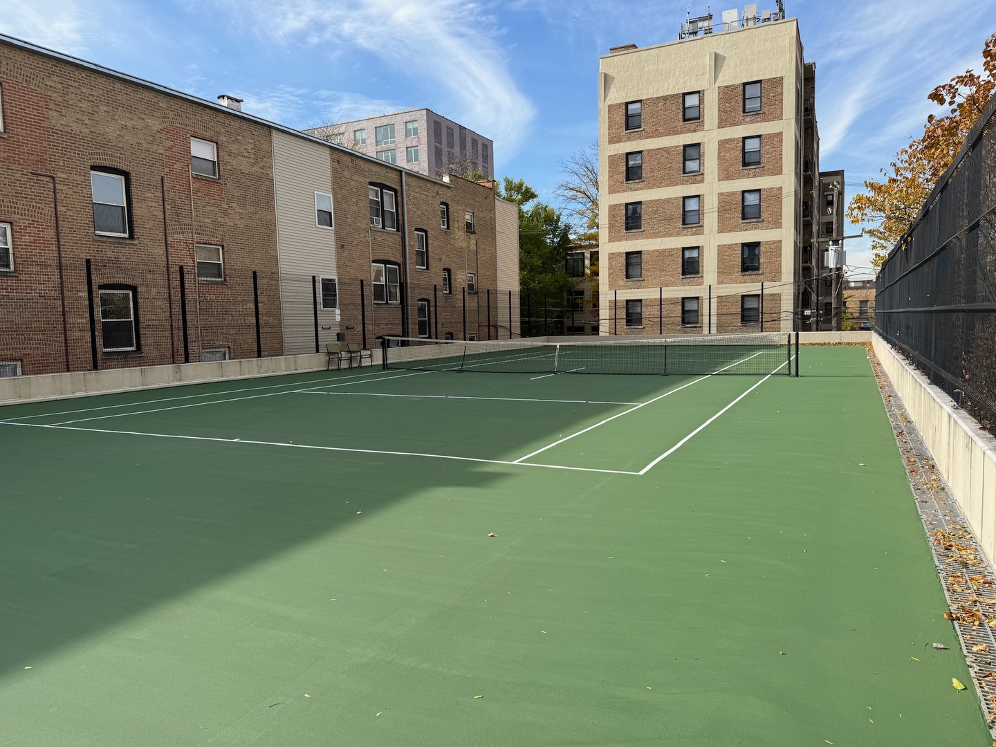 3930 North Pine Grove Avenue, Unit 1109 Chicago, IL 60613 - Photo 22 of 24 a view of a tennis court