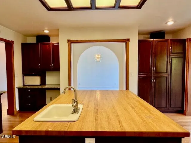 a view of a balcony with two chairs and a table