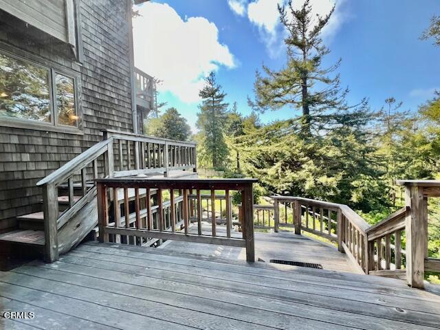 33370 Little Valley Road Fort Bragg, CA 95437 - Photo 19 of 70 a view of a balcony with wooden floor and fence