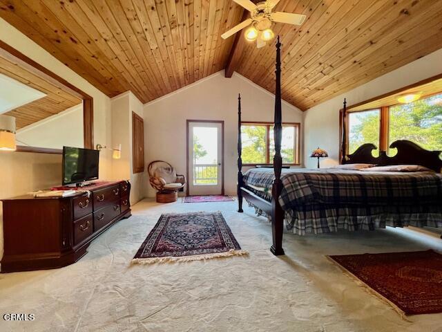 33370 Little Valley Road Fort Bragg, CA 95437 - Photo 32 of 70 a living room with furniture a flat screen tv and a floor to ceiling window