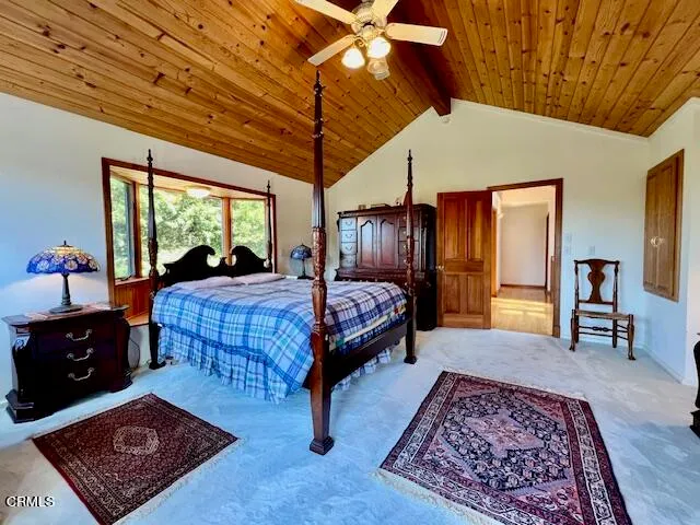 a view of a house with a yard and garage