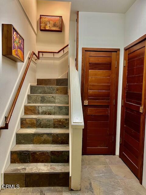 33370 Little Valley Road Fort Bragg, CA 95437 - Photo 43 of 70 a view of staircase with wooden floor and windows