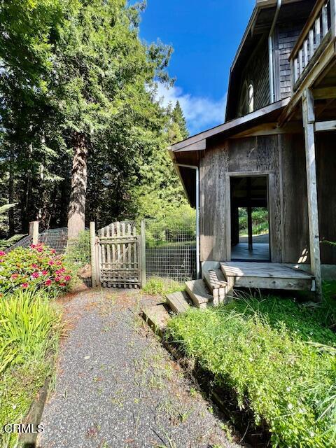 33370 Little Valley Road Fort Bragg, CA 95437 - Photo 51 of 70 a view of a house with backyard and garden