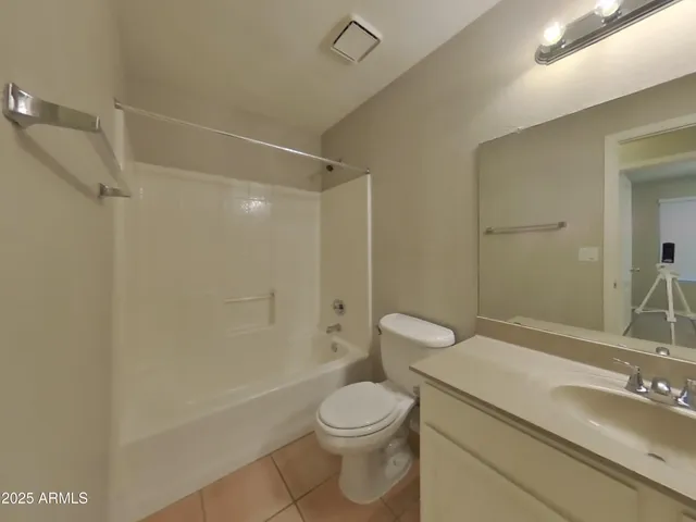 an empty room with an entryway door