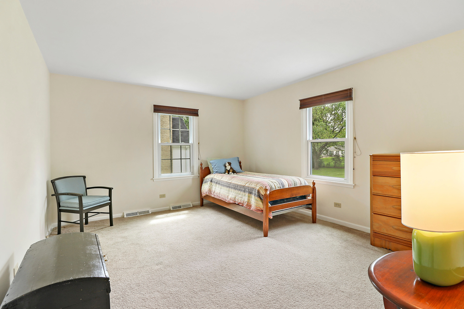 400 North Valley Road Barrington, IL 60010 - Photo 16 of 30 a spacious bedroom with a bed and a window