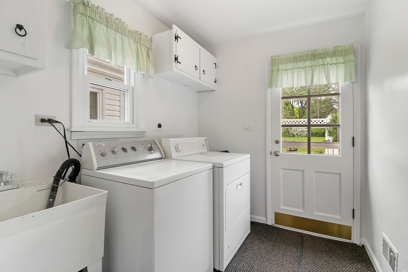 400 North Valley Road Barrington, IL 60010 - Photo 24 of 30 a utility room with cabinets washer and dryer