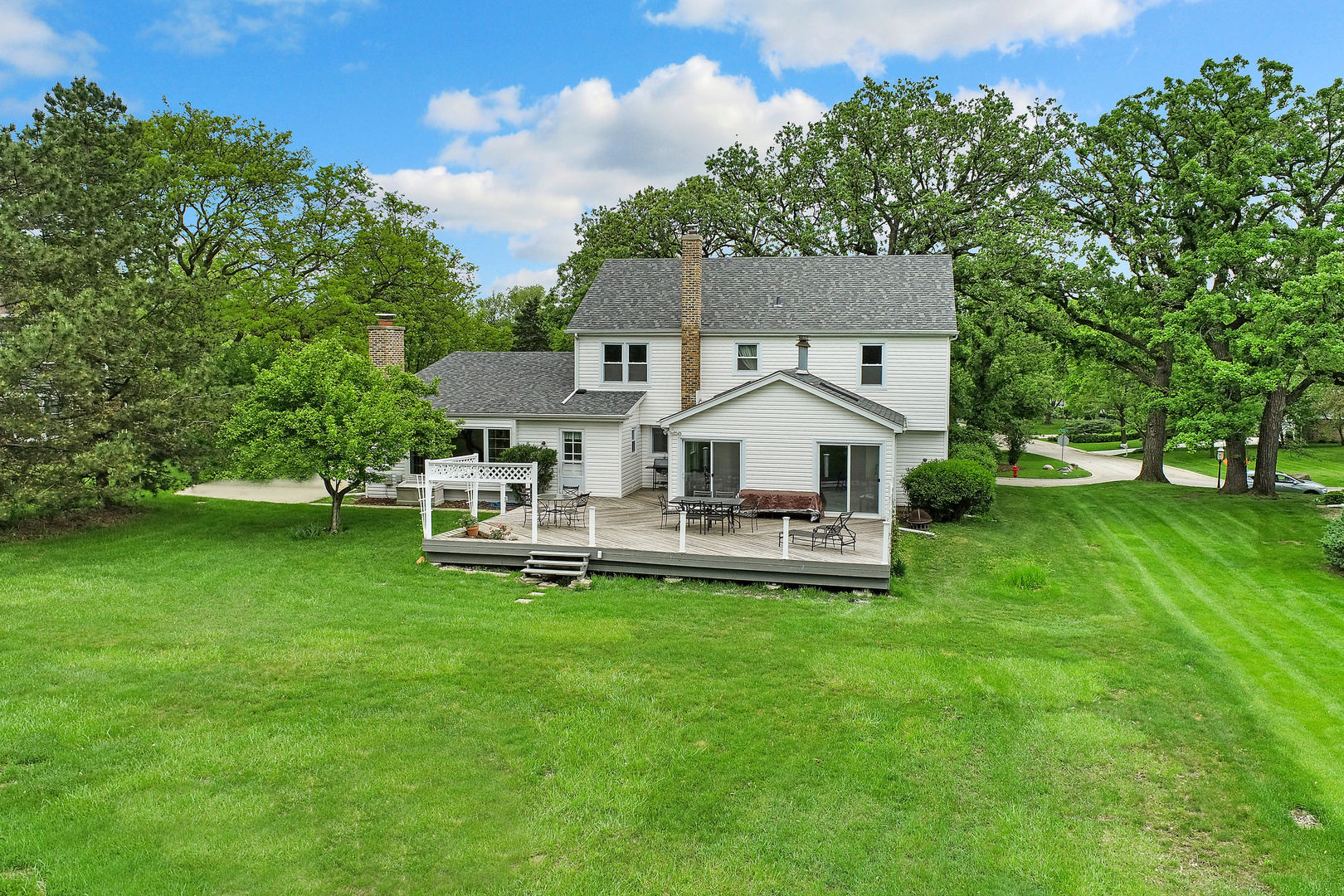 400 North Valley Road Barrington, IL 60010 - Photo 28 of 30 a view of a house with a yard porch and sitting area