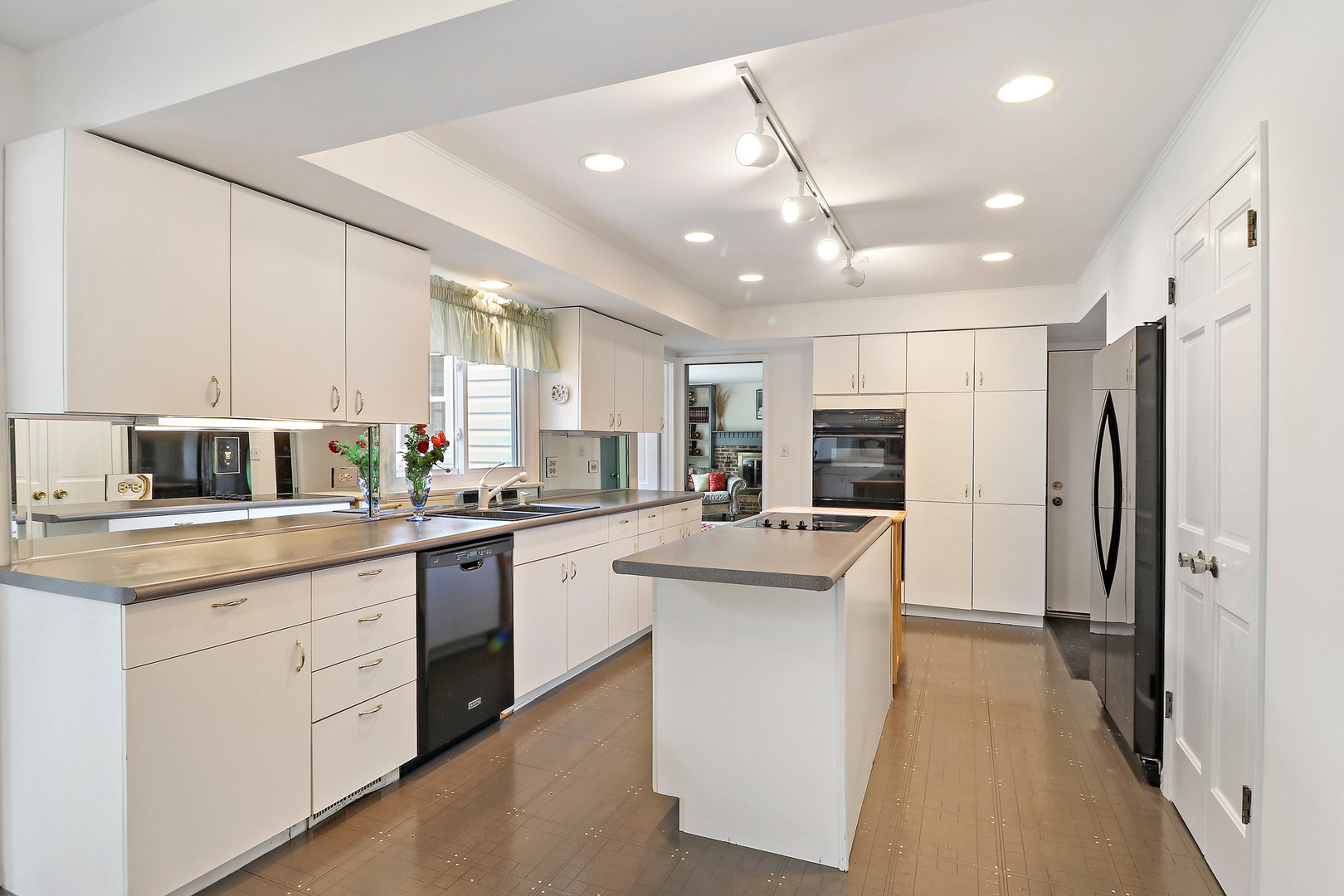 400 North Valley Road Barrington, IL 60010 - Photo 10 of 30 a kitchen with kitchen island sink stove and refrigerator