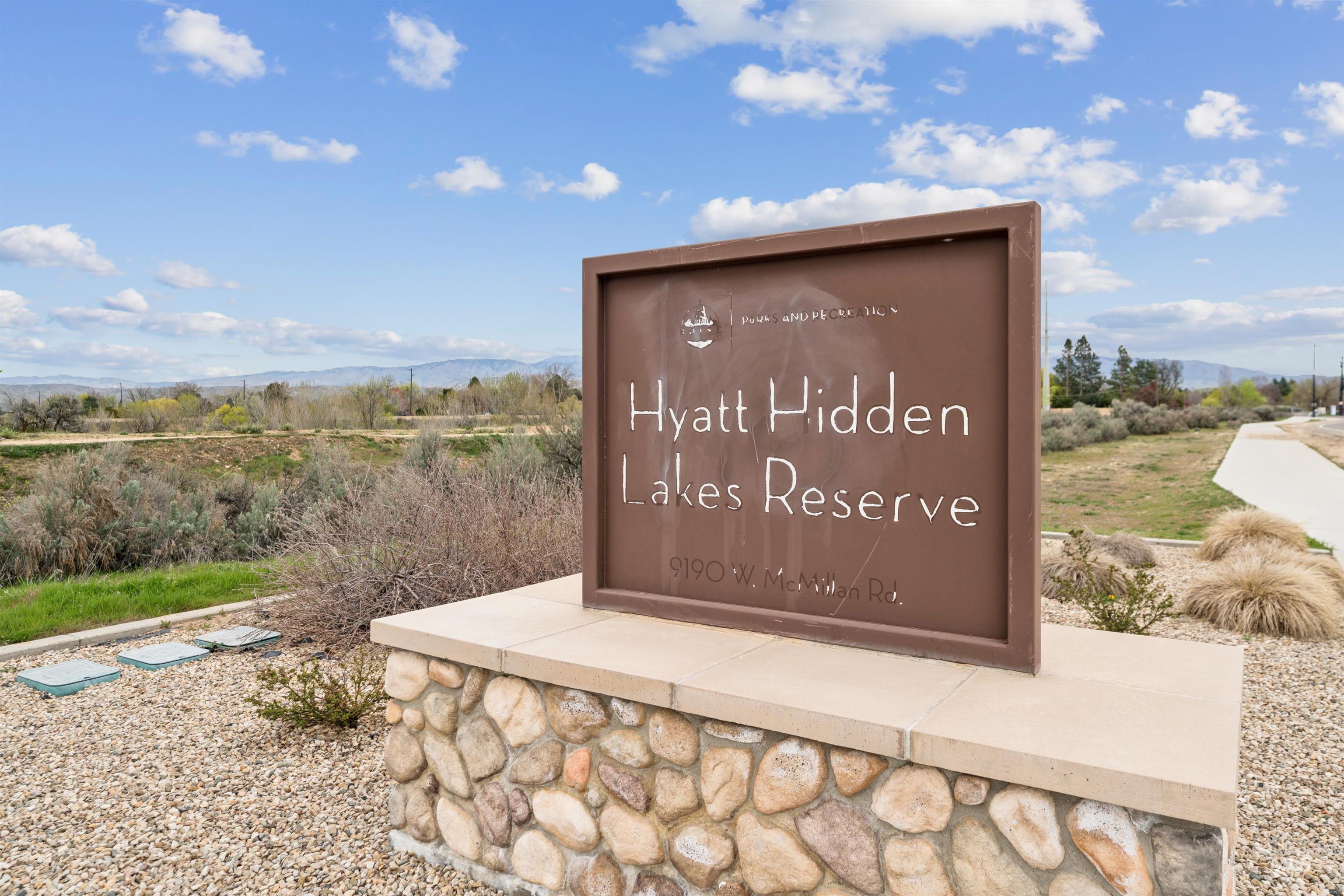 9709 West McMillan Road Boise, ID 83704 - Photo 46 of 50 Community sign featuring a mountain view