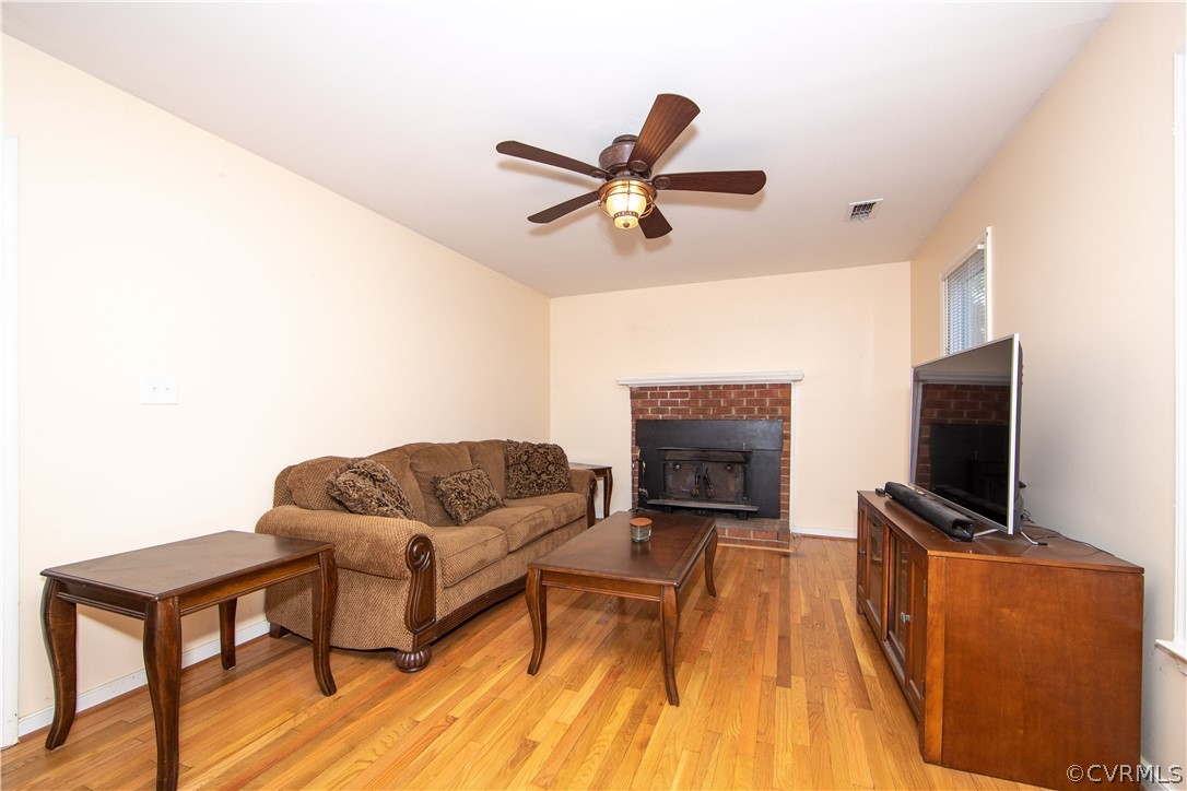 3135 Moyer Road Powhatan, VA 23139 - Photo 3 of 19 The charming living room boasts hard wood floors,