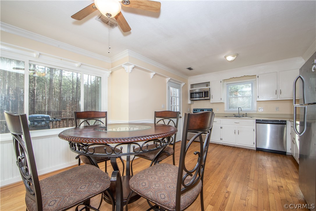3135 Moyer Road Powhatan, VA 23139 - Photo 8 of 19 Another view of the dining area and kitchen showin