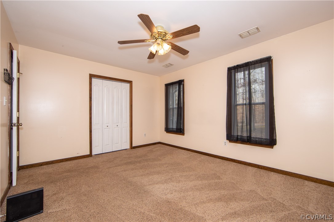 3135 Moyer Road Powhatan, VA 23139 - Photo 10 of 19 The primary bedroom also boasts a large closet.