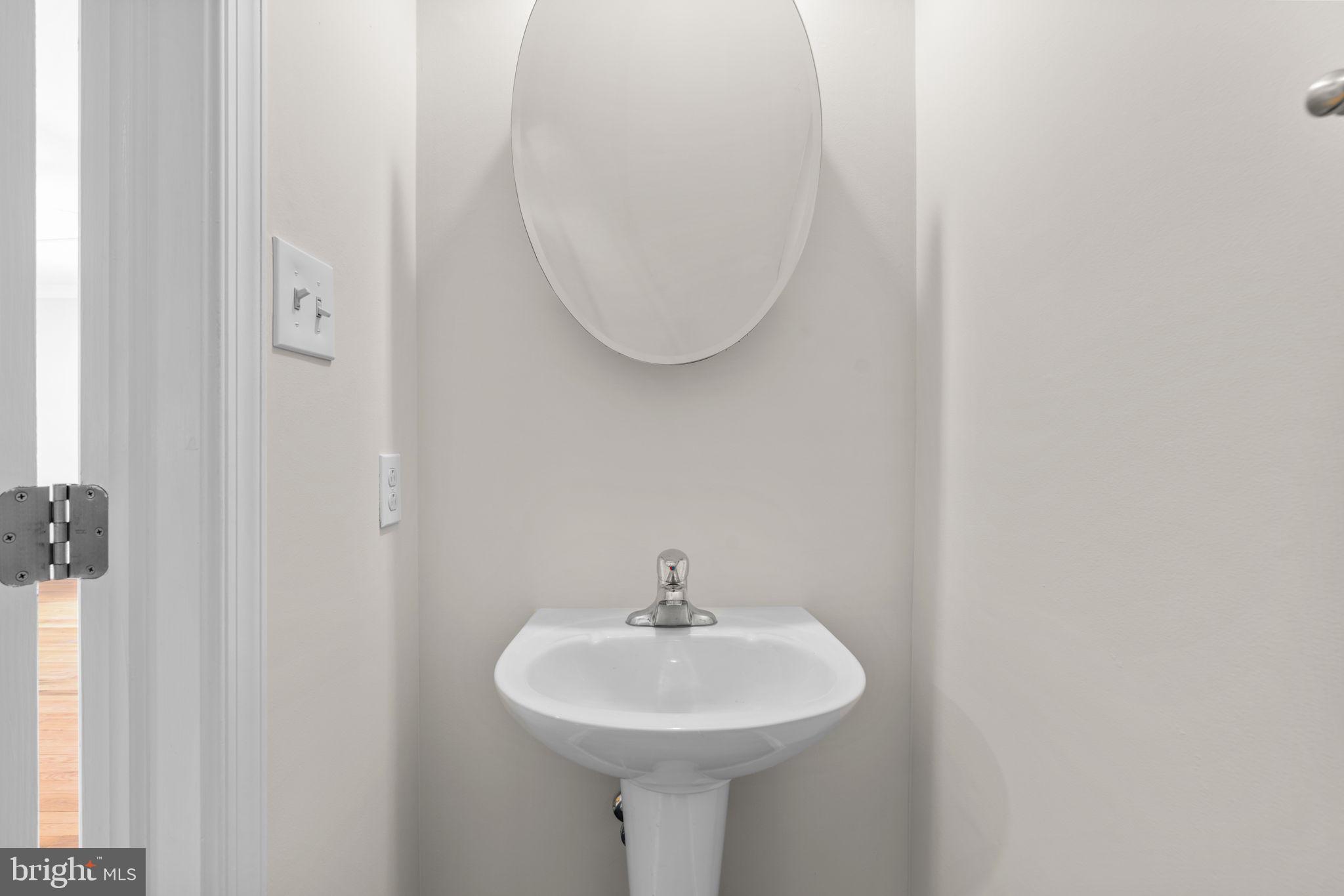 7156 Winter Rose Path Columbia, MD 21045 - Photo 17 of 58 Main Level Powder Bath