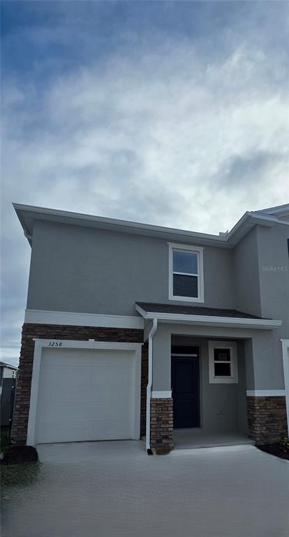 a stove top oven sitting inside of a kitchen