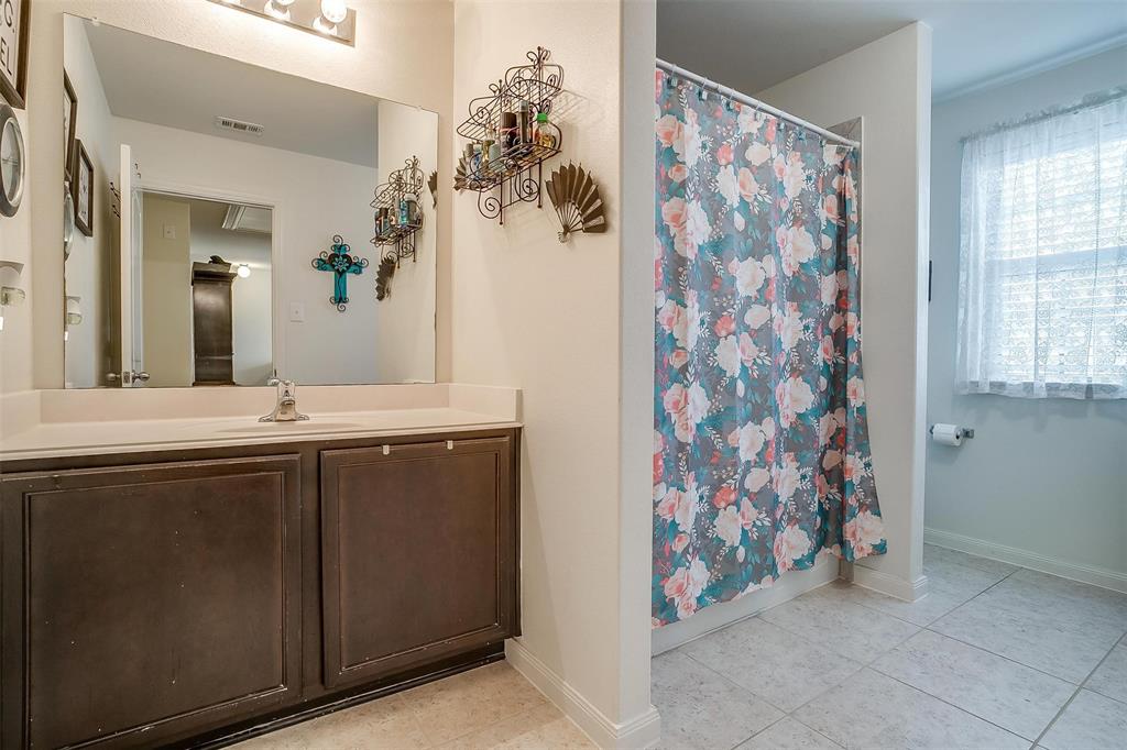 191 Presidents Way Venus, TX 76084 - Photo 18 of 30 a bathroom with a sink and a mirror