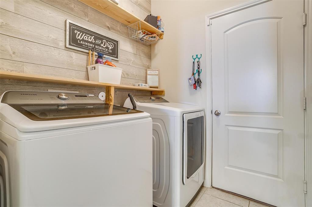 191 Presidents Way Venus, TX 76084 - Photo 24 of 30 a utility room with dryer and washer