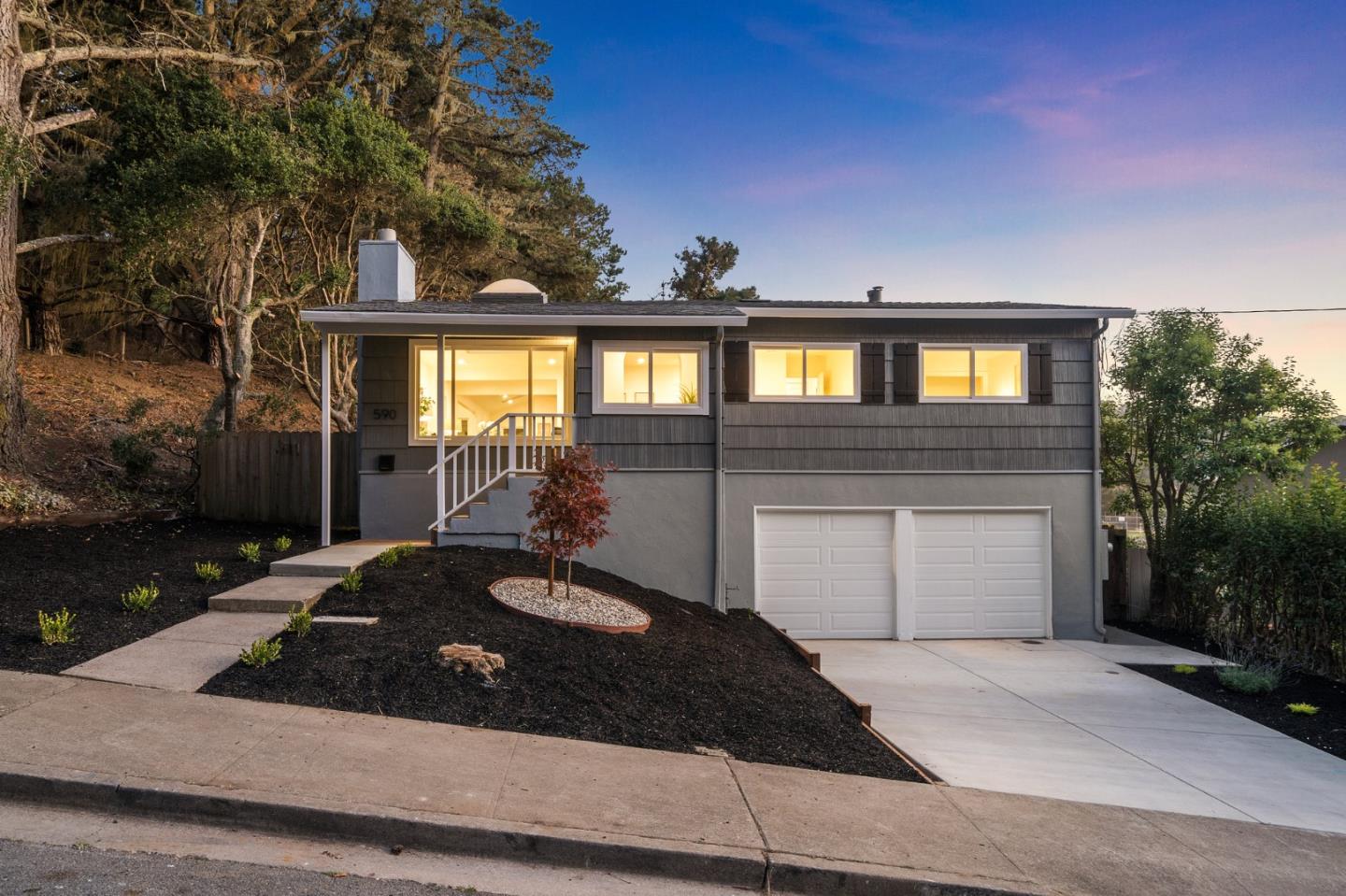 590 Ridgeway Drive Pacifica, CA 94044 - Photo 1 of 1 a front view of a house with a yard