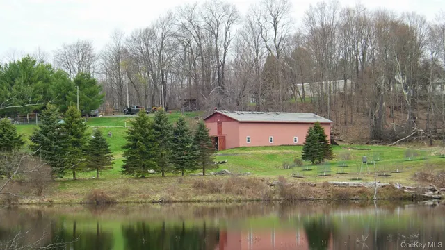 a view of lake with a yard