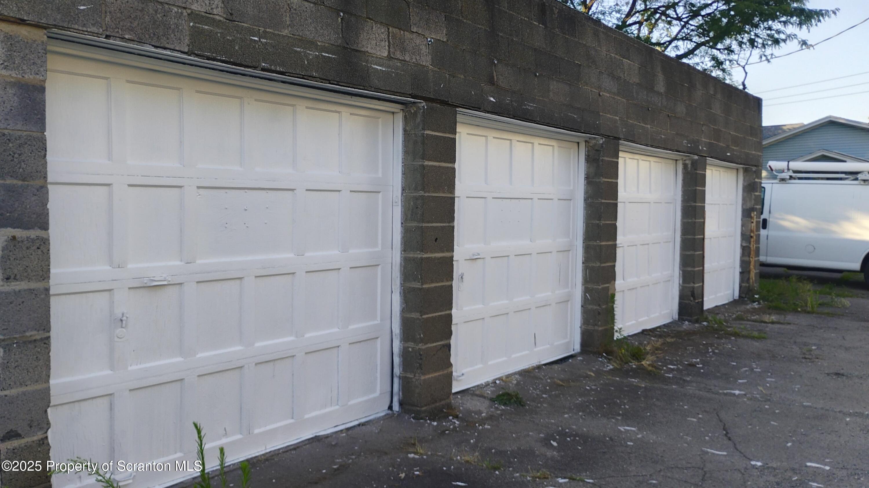 430 R Orchard Street, Unit GARAGE Scranton, PA 18505 - Photo 2 of 6 a view of walk in closet with empty racks