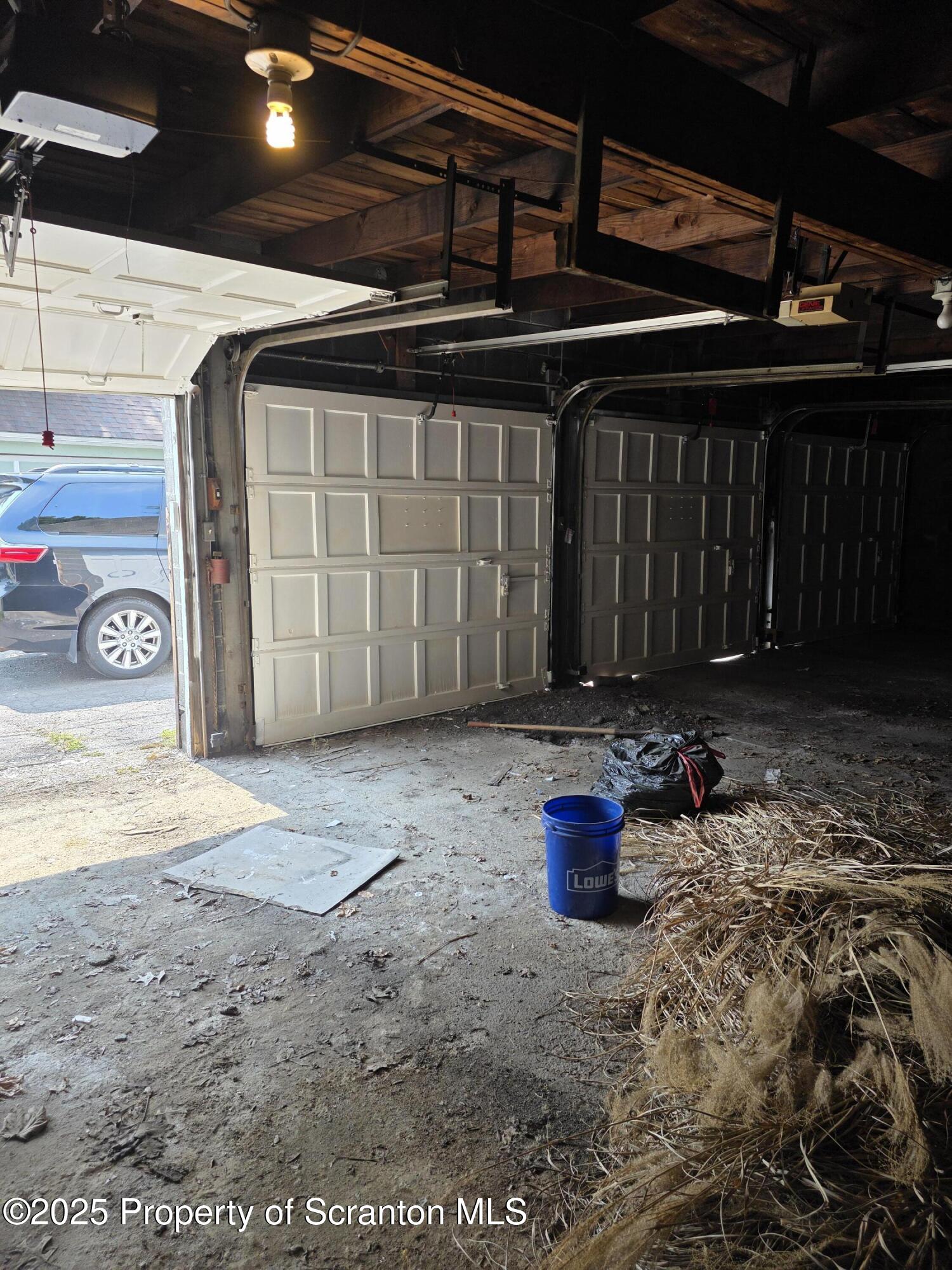 430 R Orchard Street, Unit GARAGE Scranton, PA 18505 - Photo 6 of 6 a view of water heater room with wooden floor