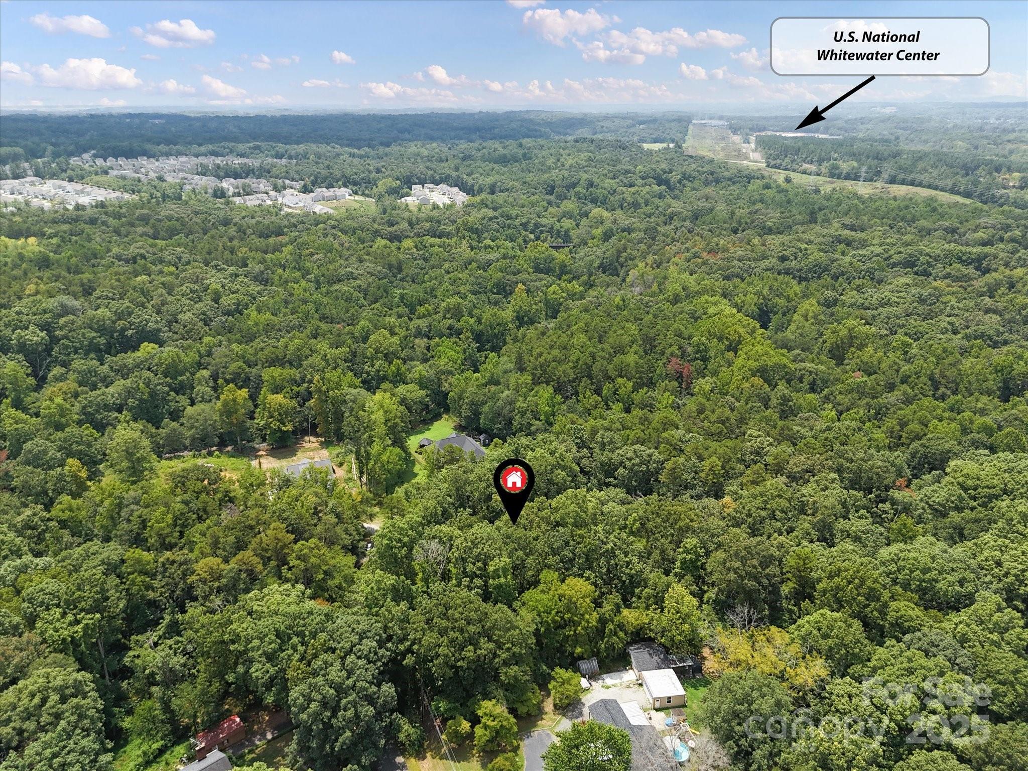 836-840 Breton Road Charlotte, NC 28214 - Photo 13 of 14 a view of a bunch of trees in a yard