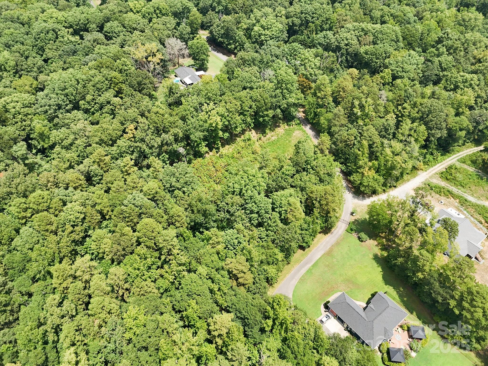 836-840 Breton Road Charlotte, NC 28214 - Photo 7 of 14 a view of a yard with a tree