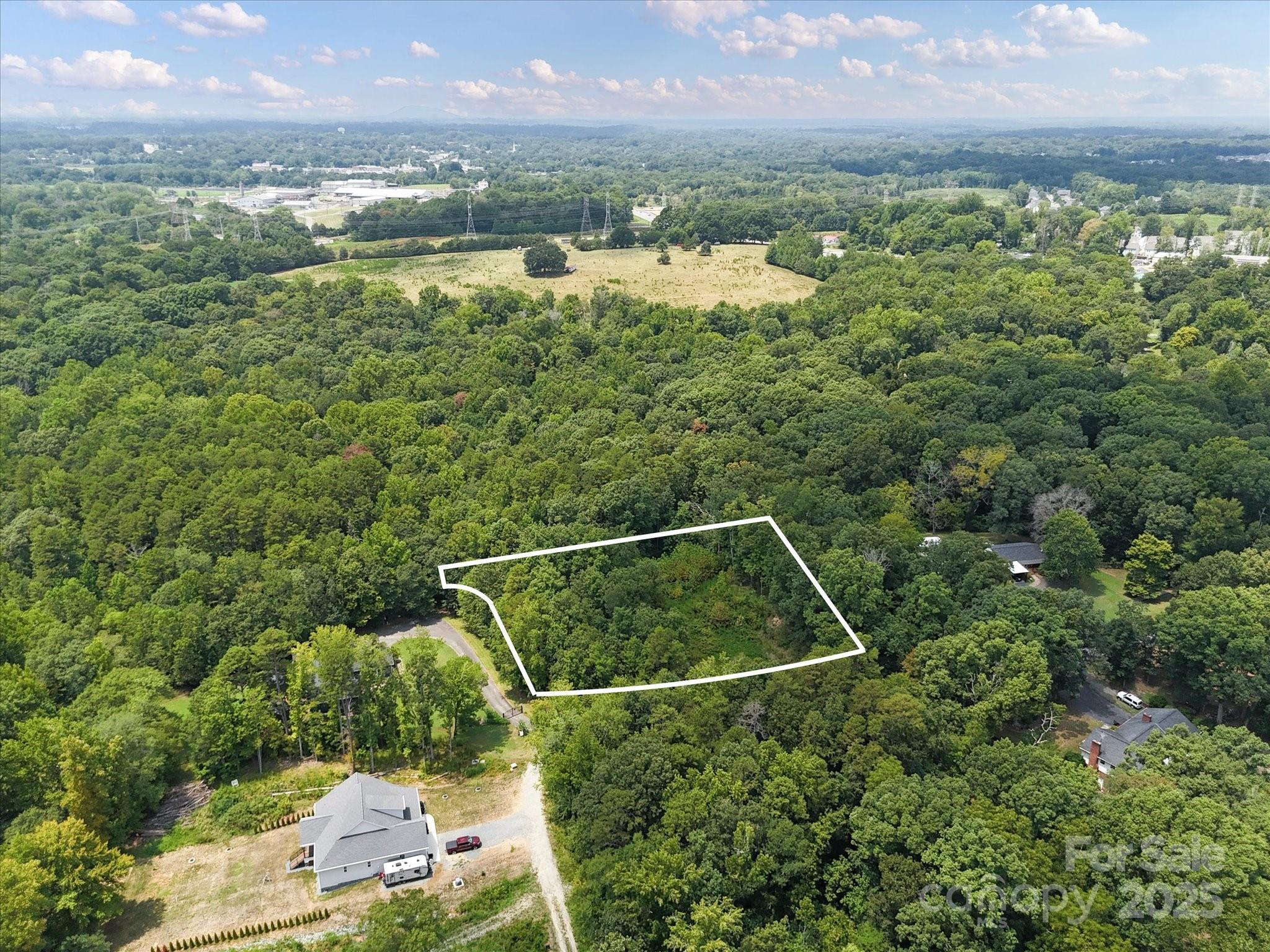 836-840 Breton Road Charlotte, NC 28214 - Photo 8 of 14 a view of a city and mountains