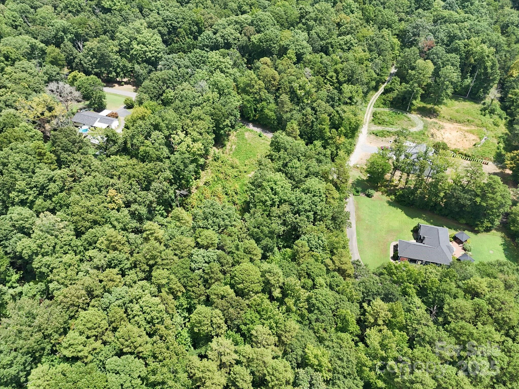 836-840 Breton Road Charlotte, NC 28214 - Photo 9 of 14 a view of a house with a tree